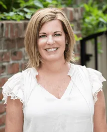 drug-treatment-center-charlotte-nc-director-finance-angie-leckie In a white blouse, Angie Leckie, Director of Finance at a drug treatment center in Charlotte NC.