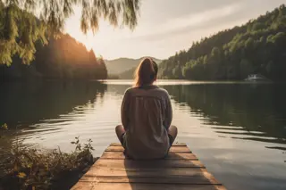 recovery-in-charlotte-nc-lake-serenity Person finding peace by a serene lake in Charlotte, NC, symbolizing recovery and tranquility.