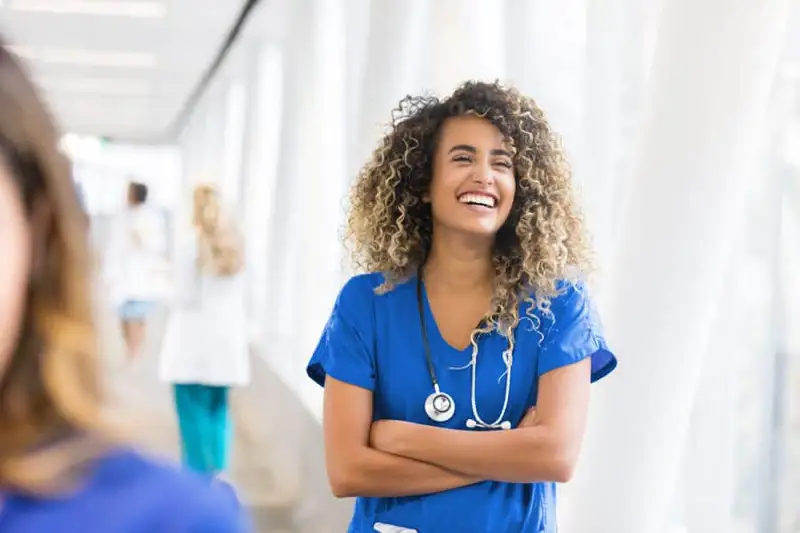Smiling nurse representing the aftercare treatment program at Dilworth Center in Charlotte, NC.