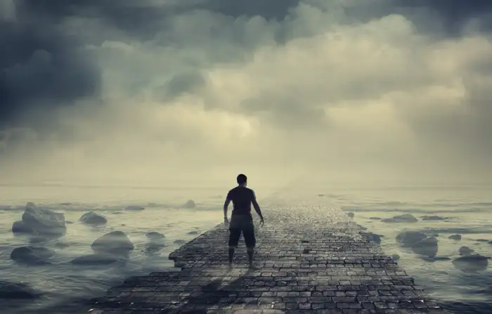 meth-addiction-recovery-journey-methamphetamine-withdrawal-symptoms A solitary figure walking down a foggy, desolate path, symbolizing the challenging and uncertain journey of recovering from meth addiction and dealing with withdrawal symptoms.